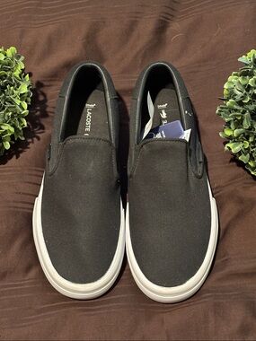 Lacoste Black Canvas Slip-On Sneakers with White Sole